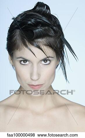 Woman with spiky hairstyle, portrait View Large Photo Image Stock Photo - Woman with spiky hairstyle, portrait. Fotosearch