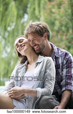 Stock Photo - Young couple, portrait. Fotosearch
