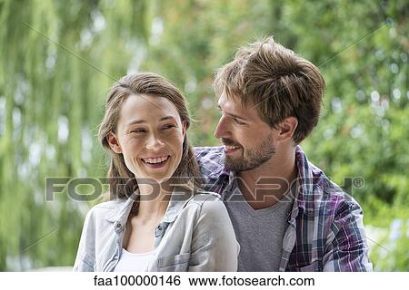Stock Photograph - Young couple, portrait. Fotosearch