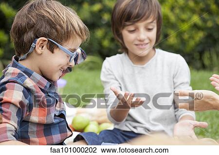 Boys playing clapping game View Large Photo Image Stock Image - Boys playing clapping game. Fotosearch