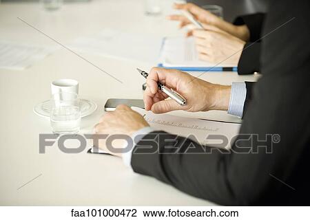 Business associates collaborating View Large Photo Image Stock Image - Business associates collaborating. Fotosearch