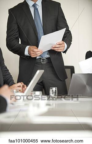 Businessman speaking at meeting View Large Photo Image Stock Photography - Businessman speaking at meeting. Fotosearch