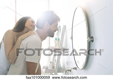Stock Photo - Couple sharing lighthearted moment together. Fotosearch