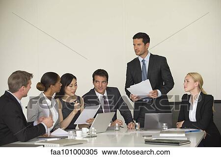 Executive giving presentation in meeting View Large Photo Image Stock Photography - Executive giving presentation in meeting. Fotosearch