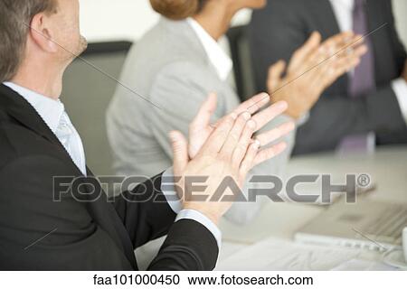Executives clapping in meeting View Large Photo Image Stock Image - Executives clapping in meeting. Fotosearch