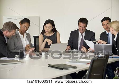 Executives in meeting View Large Photo Image Stock Image - Executives in meeting. Fotosearch