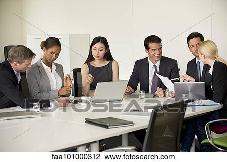Executives in meeting View Large Photo Image Stock Image - Executives in meeting. Fotosearch