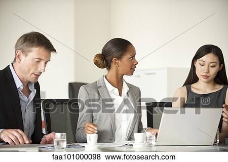 Executives in meeting View Large Photo Image Stock Photo - Executives in meeting. Fotosearch