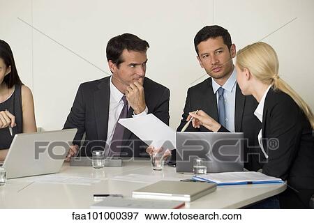 Executives in meeting View Large Photo Image Stock Photo - Executives in meeting. Fotosearch