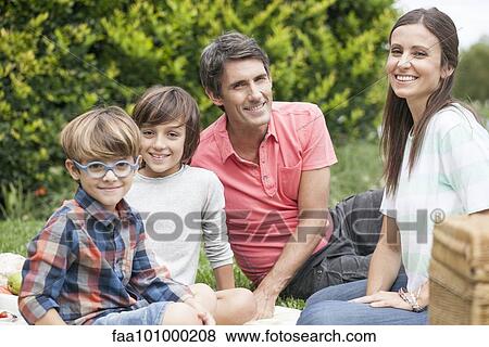 "Family at park together, portrait" View Large Photo Image Stock Photo - "Family at park together, portrait". Fotosearch