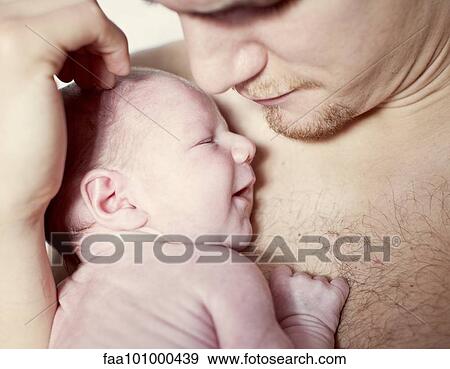"Father comforting newborn baby, close-up" View Large Photo Image Stock Photo - "Father comforting newborn baby, close-up". Fotosearch