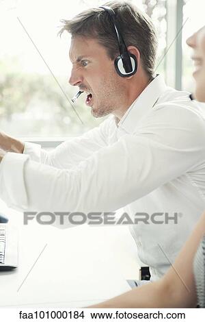 Frustrated call center worker View Large Photo Image Picture - Frustrated call center worker. Fotosearch