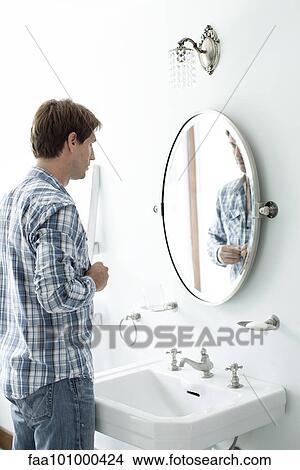 Man buttoning shirt View Large Photo Image Picture - Man buttoning shirt. Fotosearch