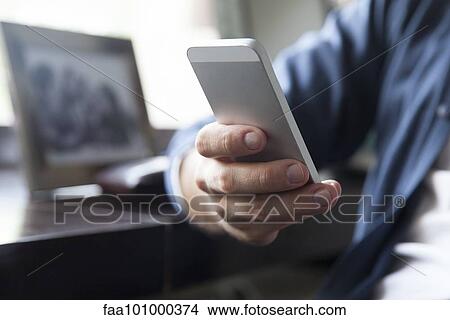 Man text messaging View Large Photo Image Picture - Man text messaging. Fotosearch