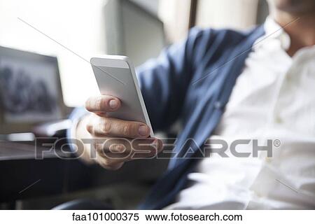 Man text messaging View Large Photo Image Stock Photography - Man text messaging. Fotosearch