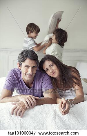 "Parents with young boys, portrait" View Large Photo Image Stock Photo - "Parents with young boys, portrait". Fotosearch