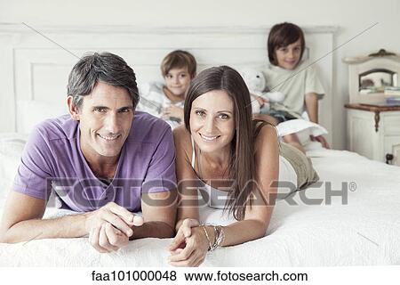 "Parents with young boys, portrait" View Large Photo Image Stock Photo - "Parents with young boys, portrait". Fotosearch