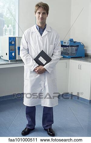"Scientist standing in laboratory, portrait" View Large Photo Image Stock Image - "Scientist standing in laboratory, portrait". Fotosearch
