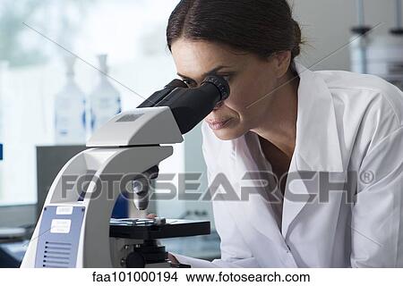 Scientist using microscope in laboratory View Large Photo Image Picture - Scientist using microscope in laboratory. Fotosearch