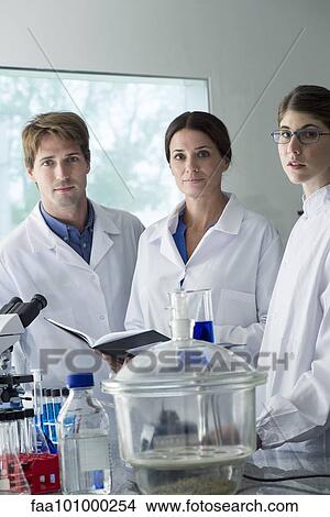 Picture - Scientists working together in laboratory. Fotosearch