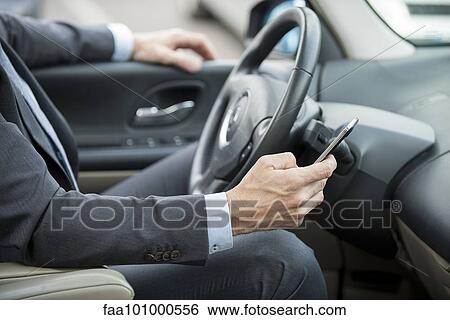 Smartphones allow professionals to stay in touch while away from the office View Large Photo Image Stock Photograph - Smartphones allow professionals to stay in touch while away from the office. Fotosearch