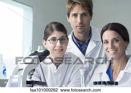 "Team of scientists in lab, portrait" View Large Photo Image Stock Image - "Team of scientists in lab, portrait". Fotosearch