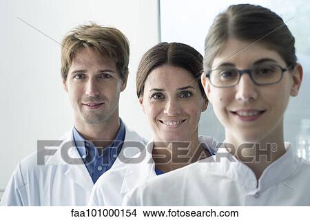 "Team of scientists, portrait" View Large Photo Image Picture - "Team of scientists, portrait". Fotosearch