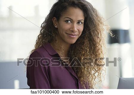 Woman daydreaming in office View Large Photo Image Stock Image - Woman daydreaming in office. Fotosearch