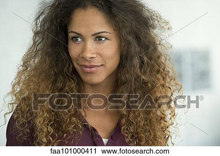 "Woman looking away, smiling, portrait" View Large Photo Image Stock Image - "Woman looking away, smiling, portrait". Fotosearch