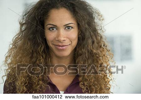 Stock Image - "Woman smiling, portrait". Fotosearch