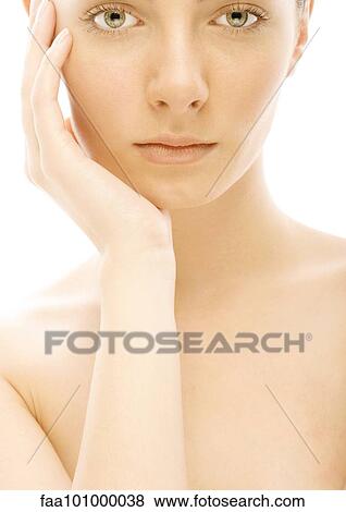 "Woman with hand on face, portrait" View Large Photo Image Stock Photo - "Woman with hand on face, portrait". Fotosearch