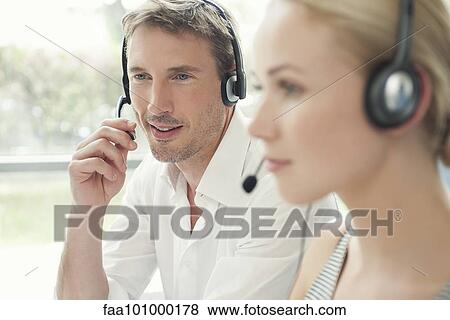 Workers in call center View Large Photo Image Stock Photo - Workers in call center. Fotosearch