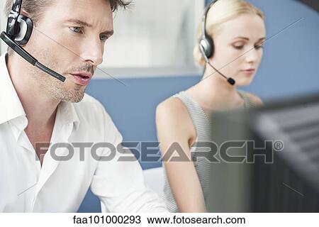Working in call center View Large Photo Image Stock Image - Working in call center. Fotosearch