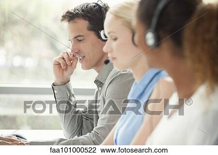 Working in call center View Large Photo Image Stock Image - Working in call center. Fotosearch