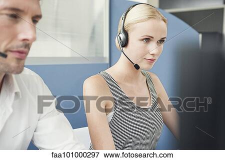 Working in call center View Large Photo Image Stock Photo - Working in call center. Fotosearch