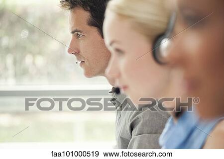 Working in call center View Large Photo Image Stock Photo - Working in call center. Fotosearch
