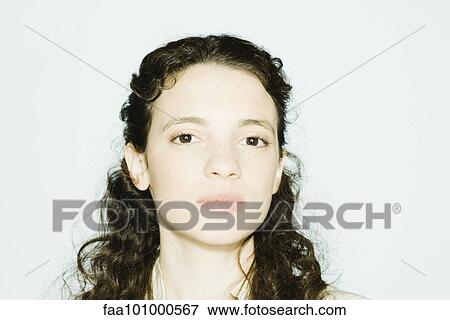 Stock Photo - "Young woman looking at camera, portrait". Fotosearch