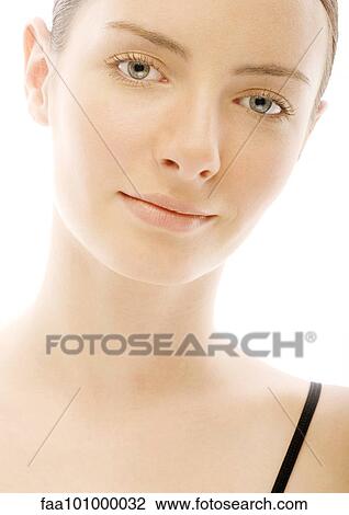 "Young woman smiling, portrait" View Large Photo Image Stock Image - "Young woman smiling, portrait". Fotosearch