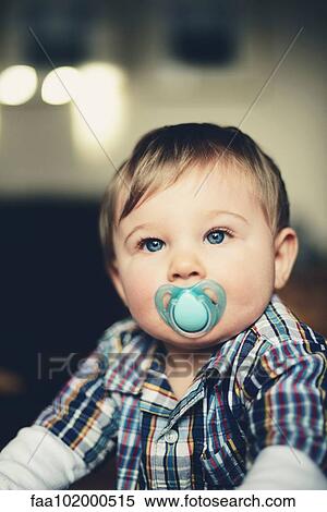 "Baby boy with pacifier in his mouth, portrait" View Large Photo Image Stock Photography - "Baby boy with pacifier in his mouth, portrait". Fotosearch