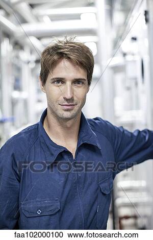 Stock Image - "Blue-collar worker, portrait". Fotosearch