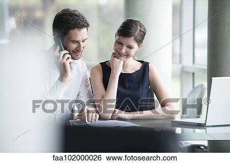 Business associates reporting good results View Large Photo Image Stock Photograph - Business associates reporting good results. Fotosearch
