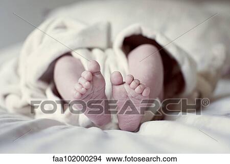 Close-up of infant's bare feet View Large Photo Image Picture - Close-up of infant's bare feet. Fotosearch
