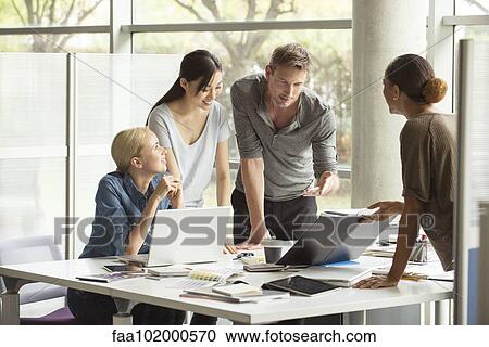 Colleagues together for brainstorming session View Large Photo Image Stock Image - Colleagues together for brainstorming session. Fotosearch