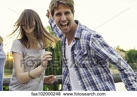 College friends partying outdoors View Large Photo Image Stock Photo - College friends partying outdoors. Fotosearch