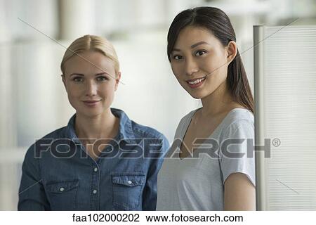 Stock Image - "Coworkers, portrait". Fotosearch