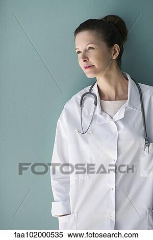 "Doctor looking away in thought, portrait" View Large Photo Image Stock Photography - "Doctor looking away in thought, portrait". Fotosearch
