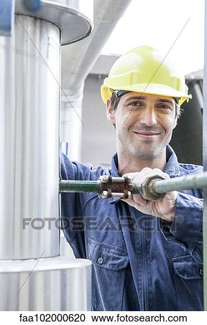 Stock Image - "Factory worker, portrait". Fotosearch