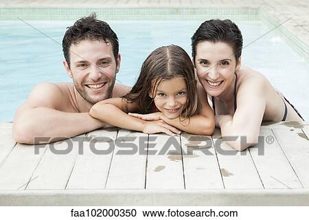 "Family relaxing together in pool, portrait" View Large Photo Image Stock Image - "Family relaxing together in pool, portrait". Fotosearch