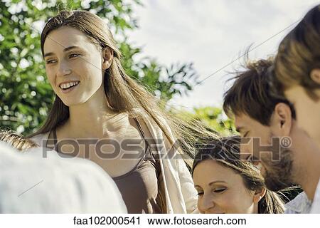 Family spending time together outdoors View Large Photo Image Stock Image - Family spending time together outdoors. Fotosearch