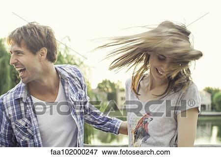 Friends partying outdoors View Large Photo Image Stock Photo - Friends partying outdoors. Fotosearch